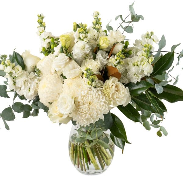 White flowers in a selection of tints and tones of whites and creams with complimentary textural foliage.