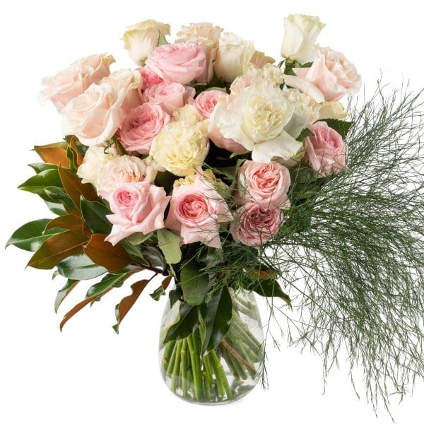 A timeless combination of roses in pastel, feminine pinks and soft white and creams make for a breathtakingly beautiful arrangement. Elegant and stylish.